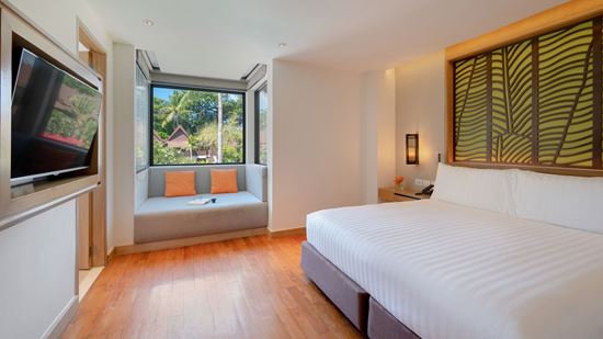 Master Bedroom in Two Bedroom Family Suite Pool View